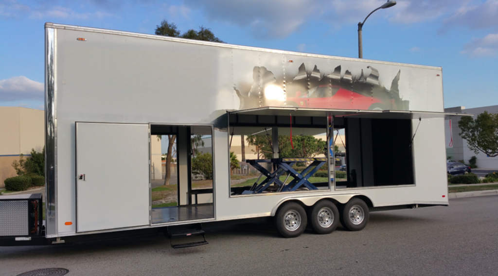 Enclosed scissor lift trailer for cars and trucks